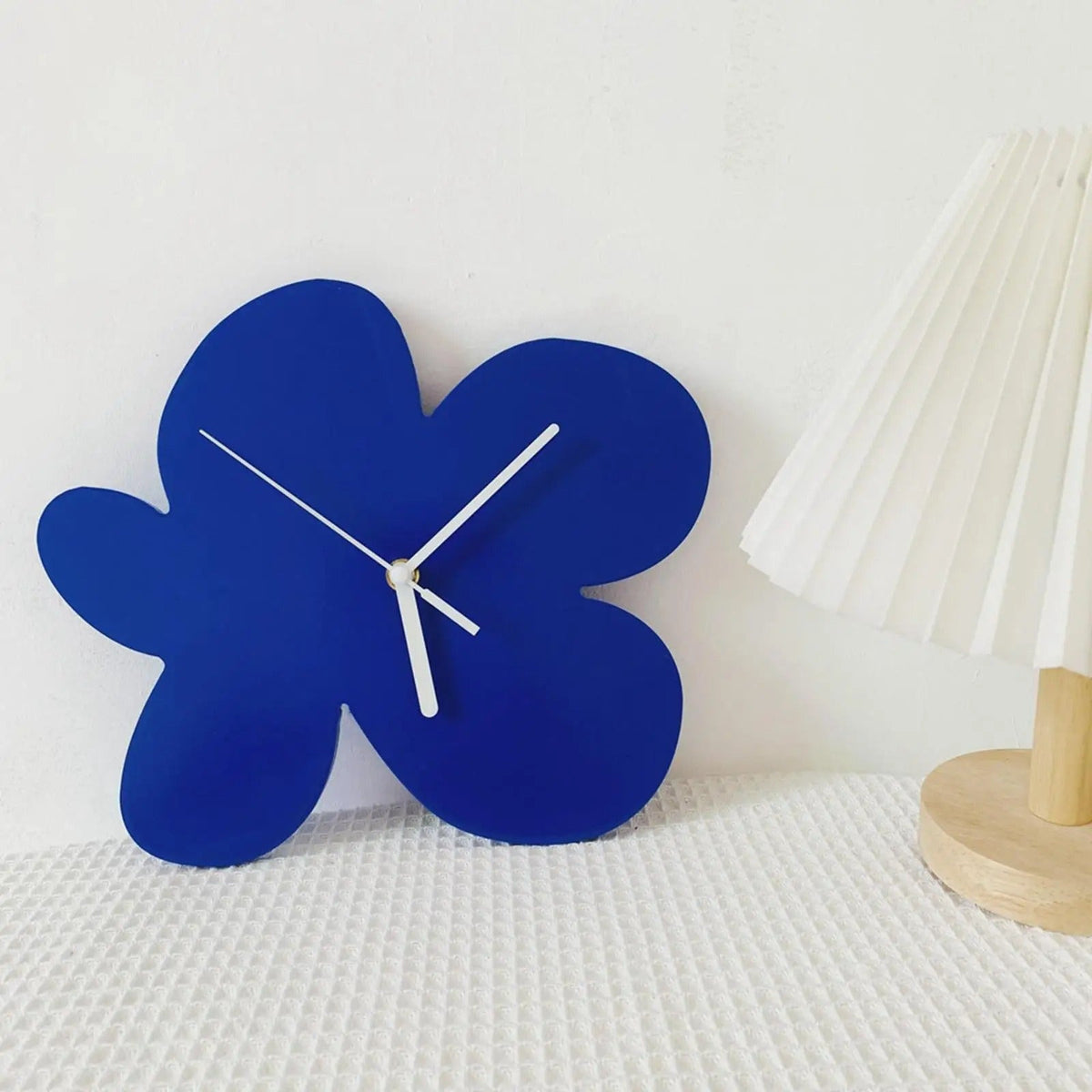 Blue organic-shape wall clock | Bloba