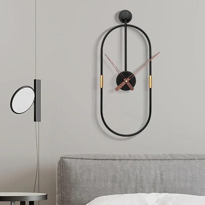 Oval Black Metal Wall Clock | Ovalo